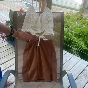 Bralette top paired with tan skirt
